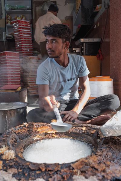 Street Sweets Vendor Stirring a Large Cauldron in Bikaner, Rajasthan Bikaner, India