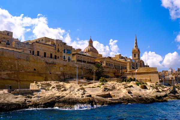 Valletta waterfront with dome and spire Valletta, Malta